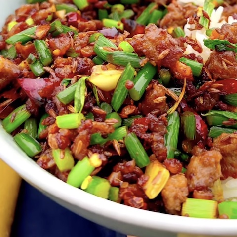 Cumin mince with garlic shoots