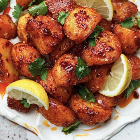 Harissa glazed roast potatoes